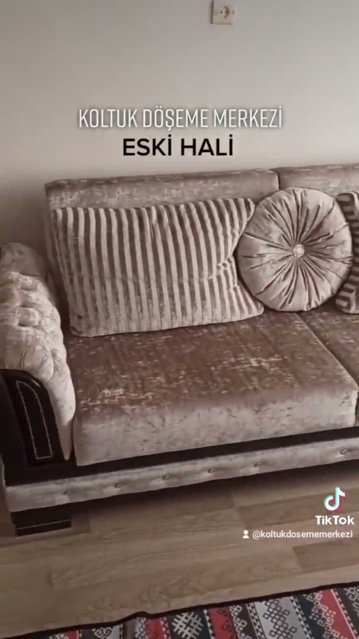 Yenilenen gri çizgili kanepe